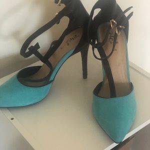Teal and black heels